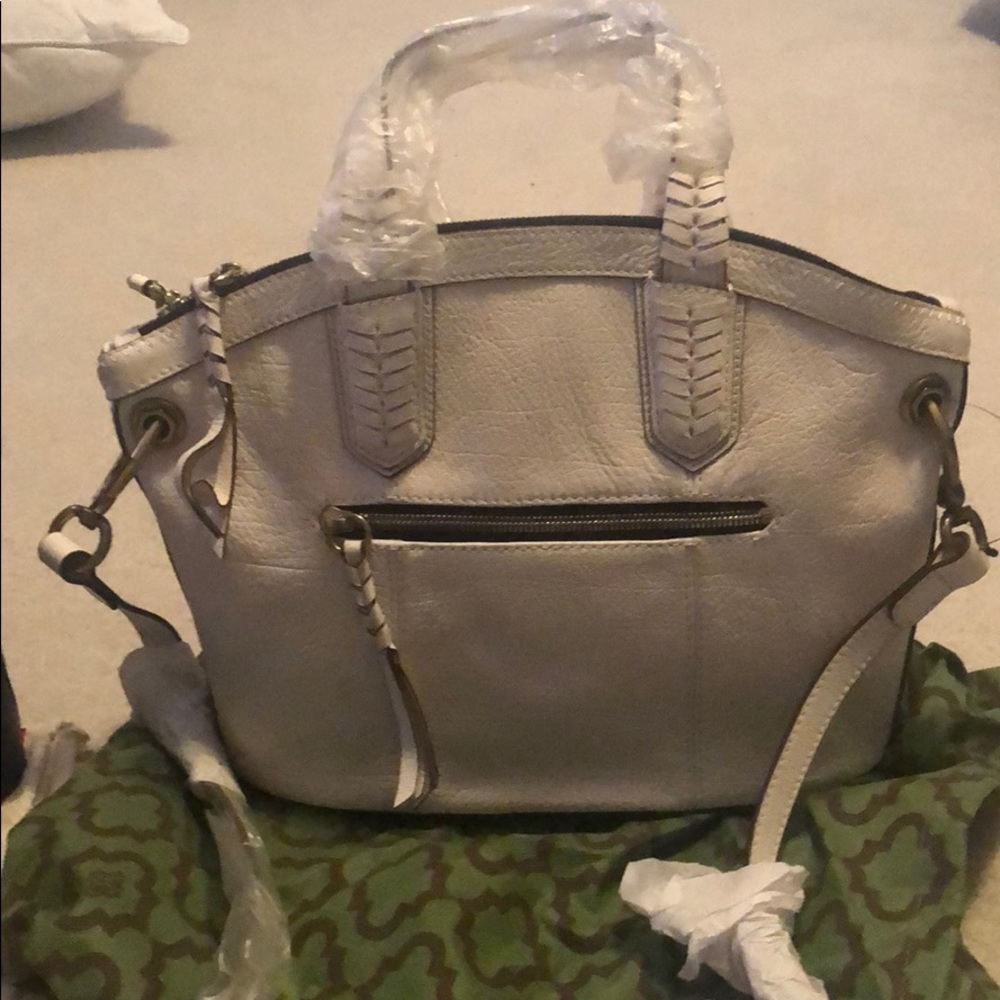 White brand new leather purse Yany